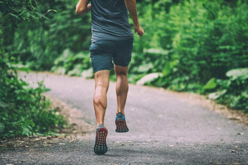 person running on verdant path after learning how to create a routine when depressed